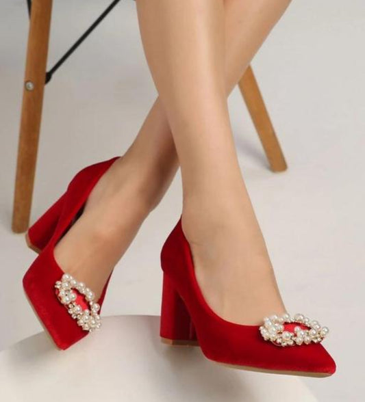 "Elevate Every Step: Dazzling Red High Heel Bellies with Gem Accents and Golden Touch."