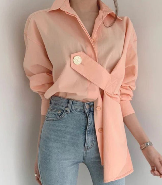 "Embrace Modern Elegance: Discover the Asymmetrical Charm of Our Light Peach Cotton Blend Shirt."