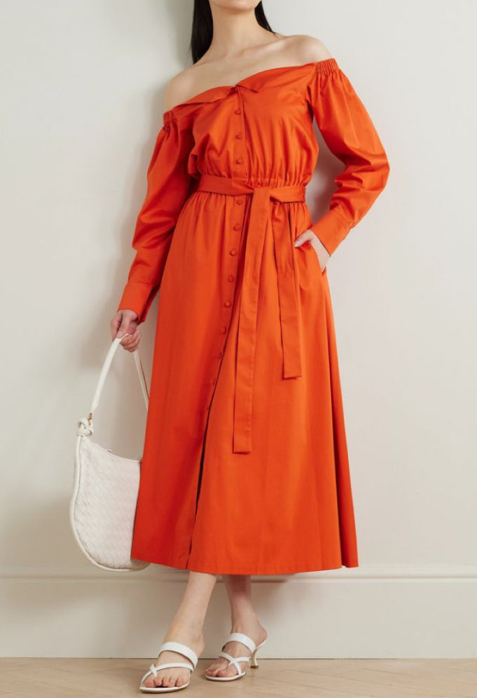 "Brighten Your Day: Embrace Bold Elegance with Our Orange Cotton Dress."